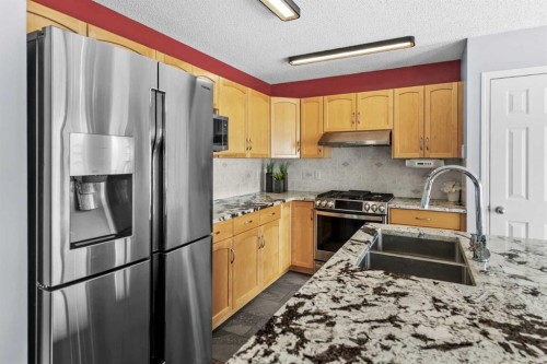 37 Evansbrooke Park Nw, Calgary, AB - Indoor Photo Showing Kitchen With Stainless Steel Kitchen With Double Sink