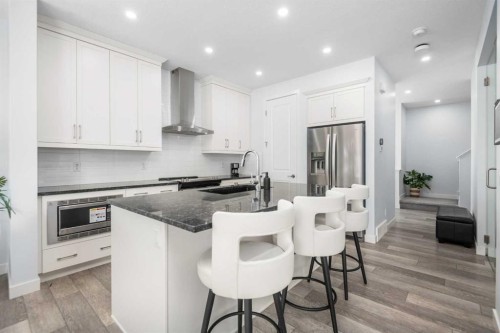 158 Magnolia Path Se, Calgary, AB - Indoor Photo Showing Kitchen With Stainless Steel Kitchen With Upgraded Kitchen