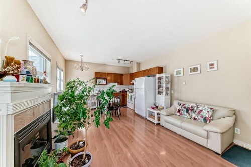 209-333 Riverfront Avenue Se, Calgary, AB - Indoor Photo Showing Living Room With Fireplace
