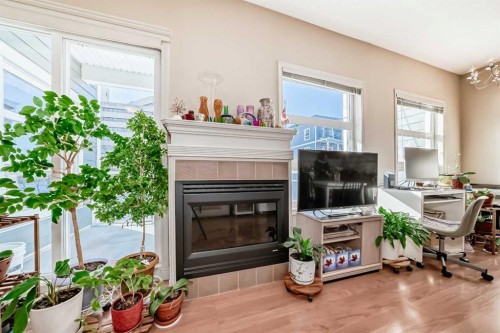 209-333 Riverfront Avenue Se, Calgary, AB - Indoor With Fireplace