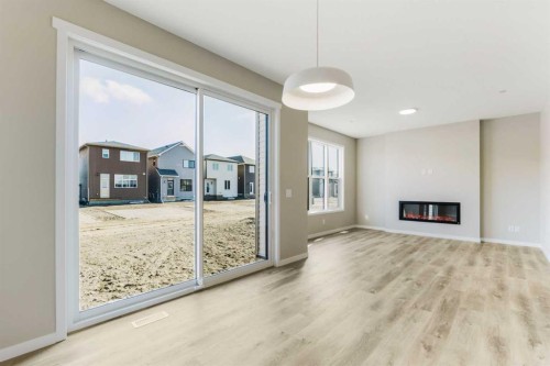 302 Hotchkiss Common Se, Calgary, AB - Indoor With Fireplace