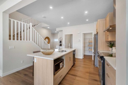434 South Shore Drive, Chestermere, AB - Indoor Photo Showing Kitchen With Double Sink With Upgraded Kitchen