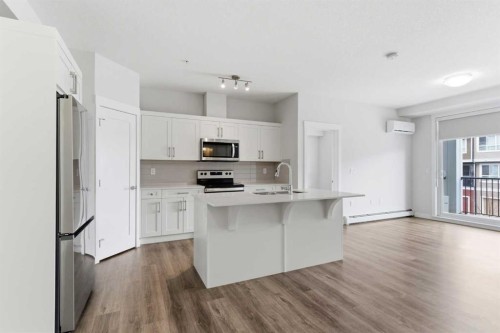 211-25 Walgrove Walk Se, Calgary, AB - Indoor Photo Showing Kitchen With Stainless Steel Kitchen With Upgraded Kitchen