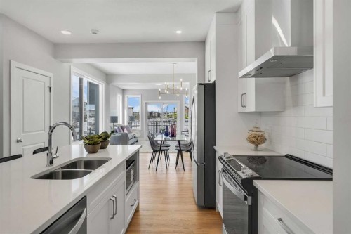 390 South Shore Drive, Chestermere, AB - Indoor Photo Showing Kitchen With Stainless Steel Kitchen With Double Sink With Upgraded Kitchen