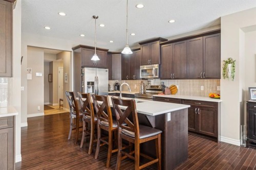 7 Cooperstown Place Sw, Airdrie, AB - Indoor Photo Showing Kitchen With Upgraded Kitchen