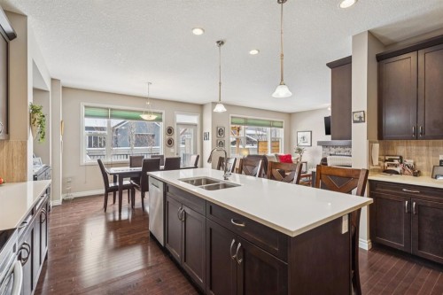 7 Cooperstown Place Sw, Airdrie, AB - Indoor Photo Showing Kitchen With Double Sink With Upgraded Kitchen