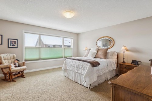 7 Cooperstown Place Sw, Airdrie, AB - Indoor Photo Showing Bedroom