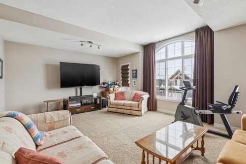 7 Cooperstown Place Sw, Airdrie, AB - Indoor Photo Showing Living Room