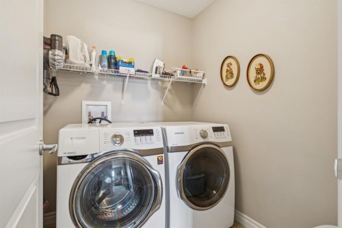 7 Cooperstown Place Sw, Airdrie, AB - Indoor Photo Showing Laundry Room