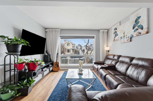 78 Martinview Crescent Ne, Calgary, AB - Indoor Photo Showing Living Room
