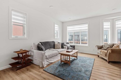 86 Spring Willow Close Sw, Calgary, AB - Indoor Photo Showing Living Room