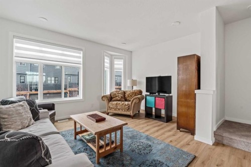 86 Spring Willow Close Sw, Calgary, AB - Indoor Photo Showing Living Room