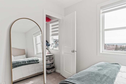 86 Spring Willow Close Sw, Calgary, AB - Indoor Photo Showing Bedroom