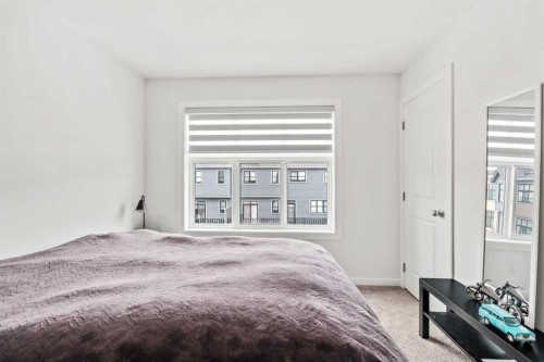 86 Spring Willow Close Sw, Calgary, AB - Indoor Photo Showing Bedroom