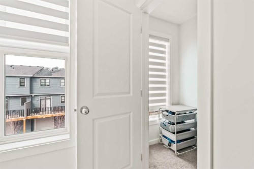86 Spring Willow Close Sw, Calgary, AB - Indoor Photo Showing Other Room