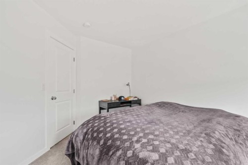 86 Spring Willow Close Sw, Calgary, AB - Indoor Photo Showing Bedroom
