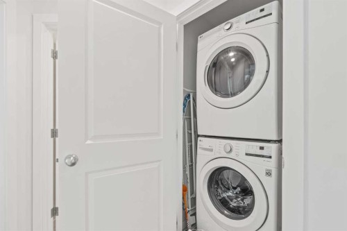 86 Spring Willow Close Sw, Calgary, AB - Indoor Photo Showing Laundry Room