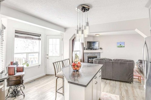 207 Crystalridge Place, Okotoks, AB - Indoor With Fireplace