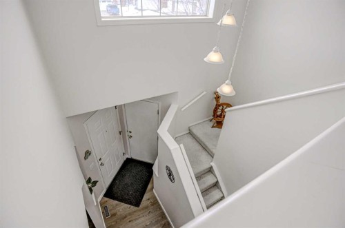 207 Crystalridge Place, Okotoks, AB - Indoor Photo Showing Other Room