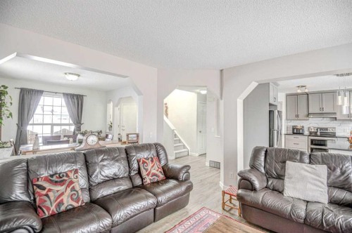 207 Crystalridge Place, Okotoks, AB - Indoor Photo Showing Living Room