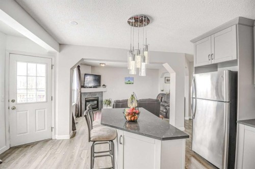 207 Crystalridge Place, Okotoks, AB - Indoor Photo Showing Other Room