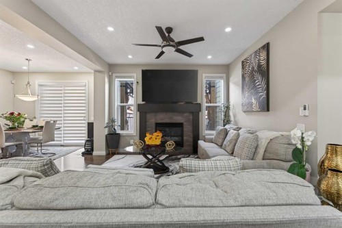 673 Marina Drive, Chestermere, AB - Indoor Photo Showing Living Room With Fireplace