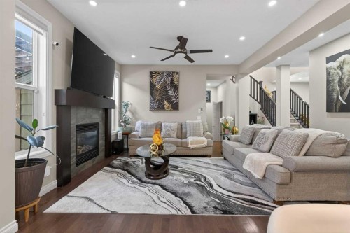 673 Marina Drive, Chestermere, AB - Indoor Photo Showing Living Room With Fireplace
