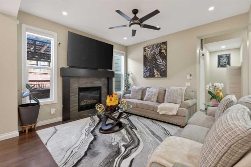 673 Marina Drive, Chestermere, AB - Indoor Photo Showing Living Room With Fireplace