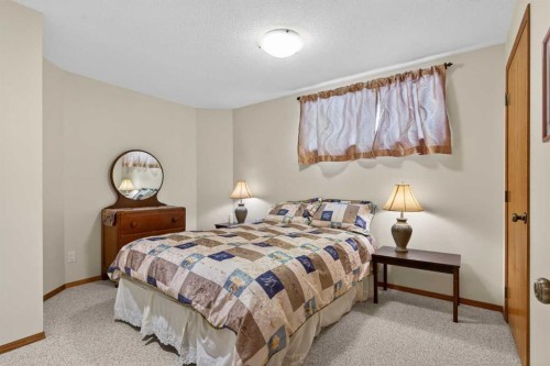 38 Tanner Close Se, Airdrie, AB - Indoor Photo Showing Bedroom