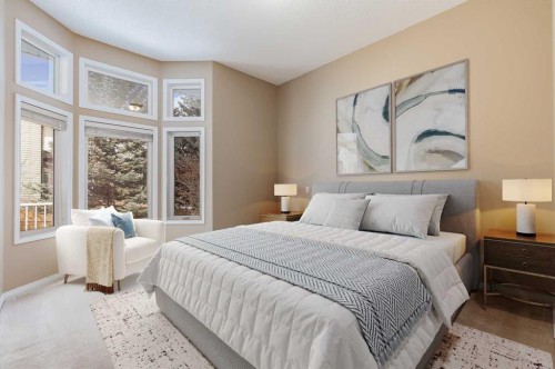 17 Rocky Ridge Villas Nw, Calgary, AB - Indoor Photo Showing Bedroom
