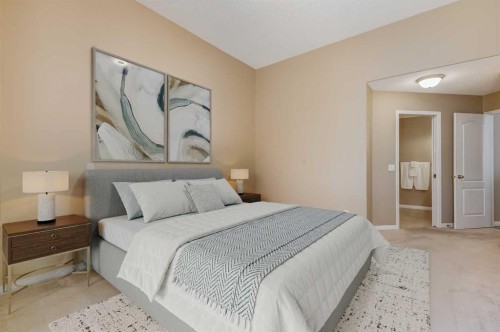 17 Rocky Ridge Villas Nw, Calgary, AB - Indoor Photo Showing Bedroom