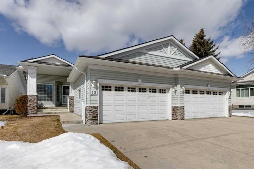 17 Rocky Ridge Villas Nw, Calgary, AB - Outdoor With Facade