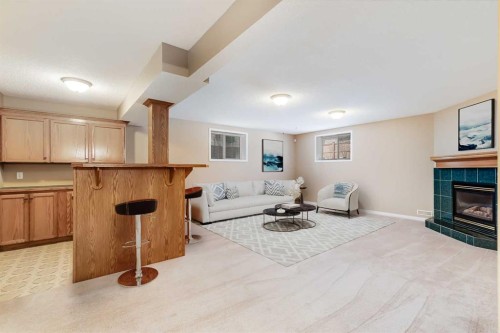 17 Rocky Ridge Villas Nw, Calgary, AB - Indoor With Fireplace
