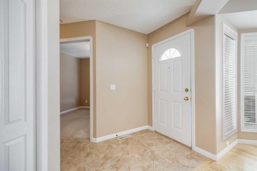 17 Rocky Ridge Villas Nw, Calgary, AB - Indoor Photo Showing Other Room