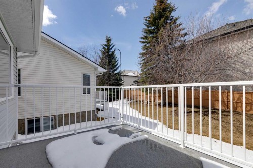17 Rocky Ridge Villas Nw, Calgary, AB - Outdoor With Balcony With Exterior