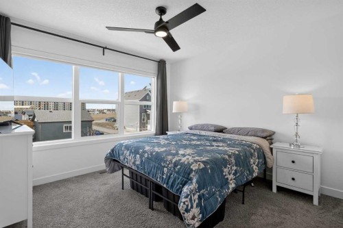 12 Heirloom Crescent Se, Calgary, AB - Indoor Photo Showing Bedroom