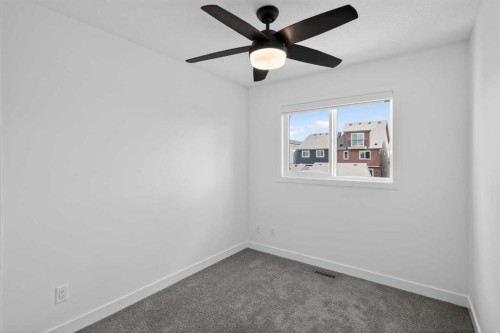 12 Heirloom Crescent Se, Calgary, AB - Indoor Photo Showing Other Room