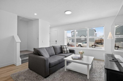 12 Heirloom Crescent Se, Calgary, AB - Indoor Photo Showing Living Room