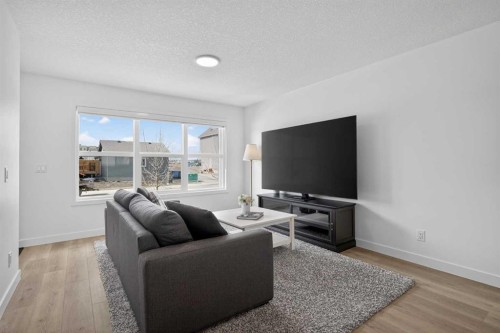 12 Heirloom Crescent Se, Calgary, AB - Indoor Photo Showing Living Room