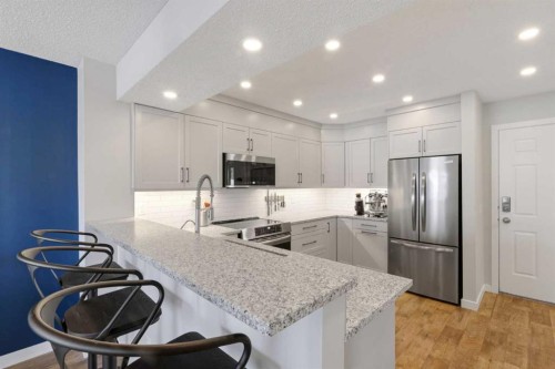 85 Cedarview Mews Sw, Calgary, AB - Indoor Photo Showing Kitchen With Stainless Steel Kitchen With Upgraded Kitchen