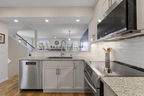 85 Cedarview Mews Sw, Calgary, AB - Indoor Photo Showing Kitchen With Stainless Steel Kitchen With Upgraded Kitchen