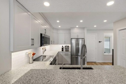 85 Cedarview Mews Sw, Calgary, AB - Indoor Photo Showing Kitchen With Stainless Steel Kitchen With Upgraded Kitchen