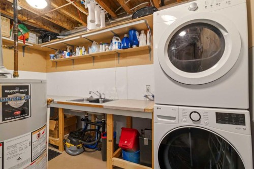 85 Cedarview Mews Sw, Calgary, AB - Indoor Photo Showing Laundry Room
