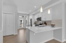 118 Legacy Path Se, Calgary, AB  - Indoor Photo Showing Kitchen With Double Sink With Upgraded Kitchen 