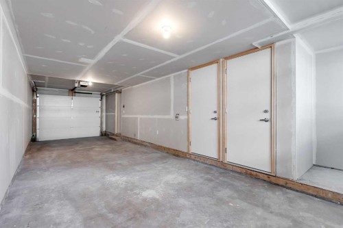 118 Legacy Path Se, Calgary, AB - Indoor Photo Showing Garage
