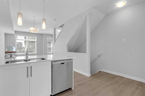 118 Legacy Path Se, Calgary, AB - Indoor Photo Showing Kitchen With Double Sink