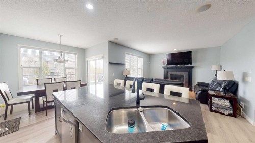 983 Auburn Bay Boulevard Se, Calgary, AB - Indoor With Fireplace