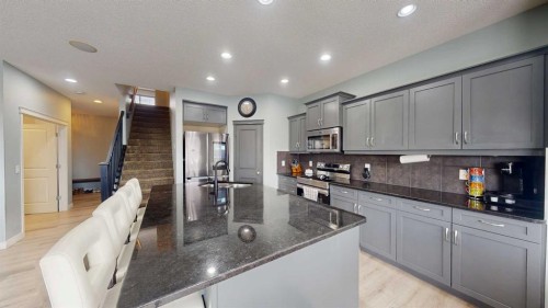 983 Auburn Bay Boulevard Se, Calgary, AB - Indoor Photo Showing Kitchen With Upgraded Kitchen