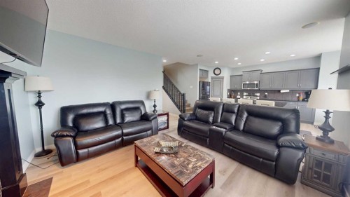 983 Auburn Bay Boulevard Se, Calgary, AB - Indoor Photo Showing Living Room