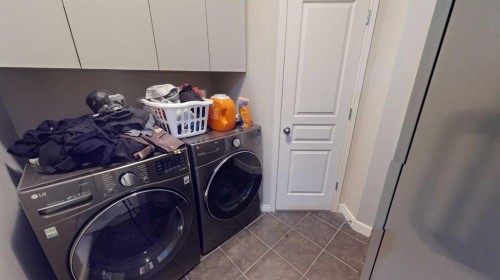 983 Auburn Bay Boulevard Se, Calgary, AB - Indoor Photo Showing Laundry Room
